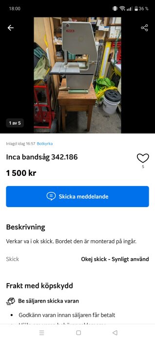 Inca bandsåg modell 342.186 i ett garage, placerad på ett träbord. Den är till salu för 1 500 kr och beskrivs som i okej skick.