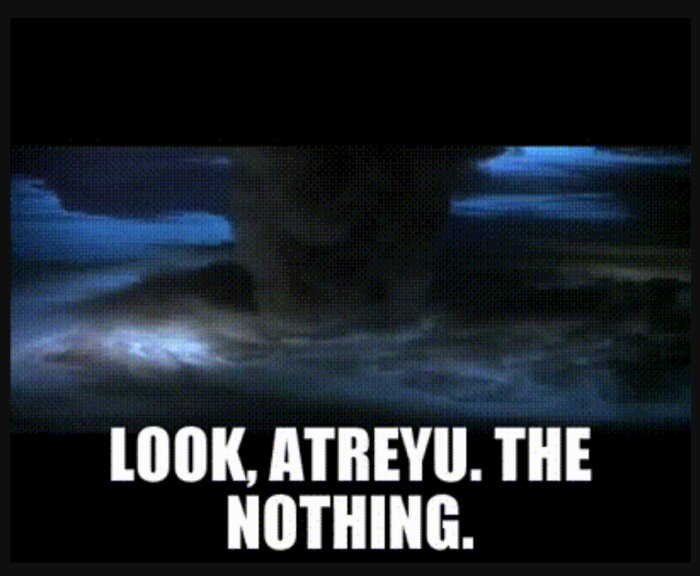 En scen från en film med texten "Look, Atreyu. The Nothing." i ett stormigt landskap.