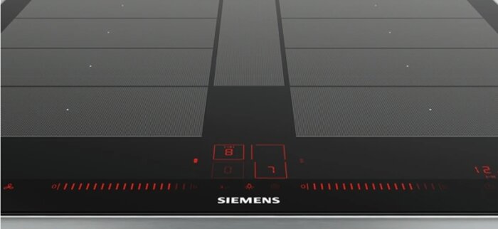 Siemens induktionshäll med rutnät av grå prickar och rödbelysta kontroller framtill, Schott Ceran glas, diskuterad för repkänslighet.