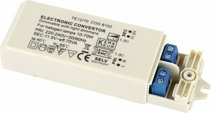 Vit elektronisk transformator för halogenlampor med specifikationer och blå anslutningsterminaler.