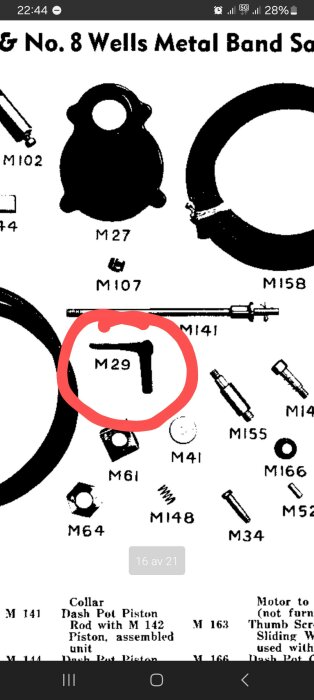 Ritad detaljritning av metallbandsåg M29, med en röd markering runt en L-formad del på en teknisk planskiss.