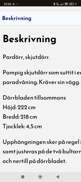 Textbeskrivning av en stor par-skjutdörr med mått: höjd 222 cm, bredd 218 cm, tjocklek 4,5 cm. Pampig dörr för paradvåning.