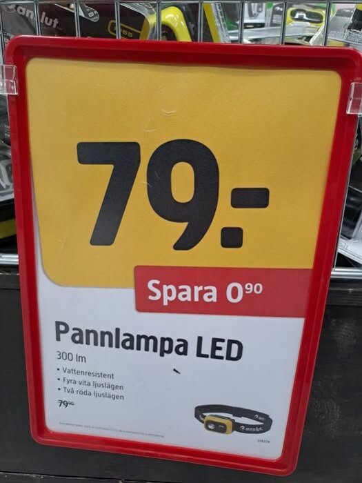 Skylt för pannlampa LED, pris 79 kr, vattenresistent, 300 lm, fyra vita och två röda ljuslägen, erbjudande spar 0,90 kr.