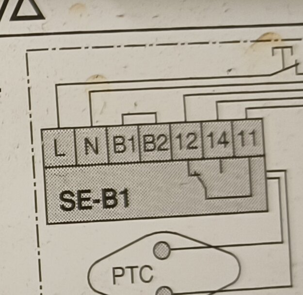 Kopplingsschema med olika anslutningspunkter som L, N, B1, B2 och nummer 12, 14, 11. Betydelse oklar, refererad som "overkill" med lampor.