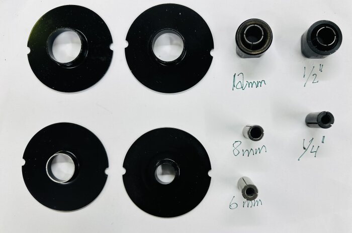 Svarta cirkulära insatser och metallhylsor för fräsverktyg, märkta med storlekarna 12mm, 1/2", 8mm, 1/4", och 6mm på en vit bakgrund.