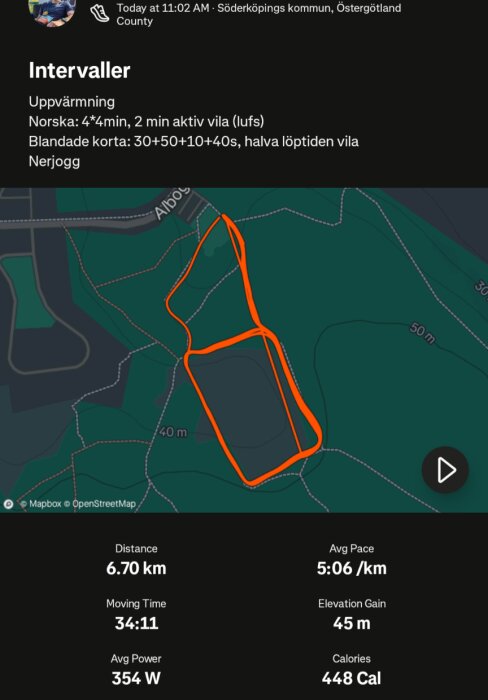 Träningspass i Söderköping med intervaller synliga som orange rutt på karta, distans 6,70 km, medeltempo 5:06 min/km, 448 kalorier förbrända.