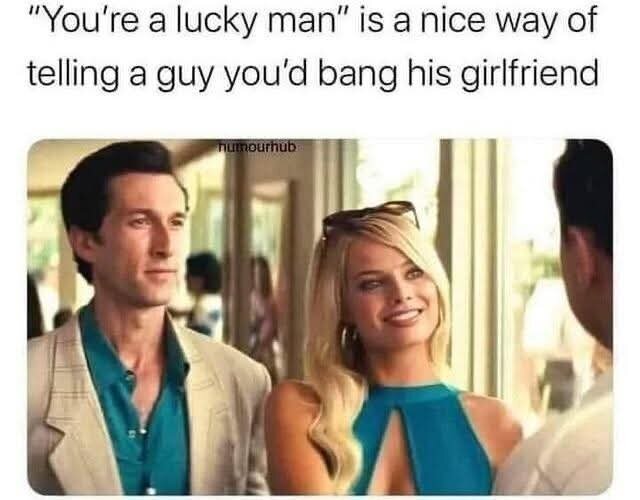 En man i beige kavaj står bredvid en kvinna i blå klänning; texten ovan lyder: "You're a lucky man" is a nice way of telling a guy you’d bang his girlfriend".