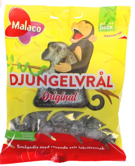 En påse Djungelvrål-godis från Malaco med en tecknad apa på framsidan. Smågodis med salt lakritssmak.