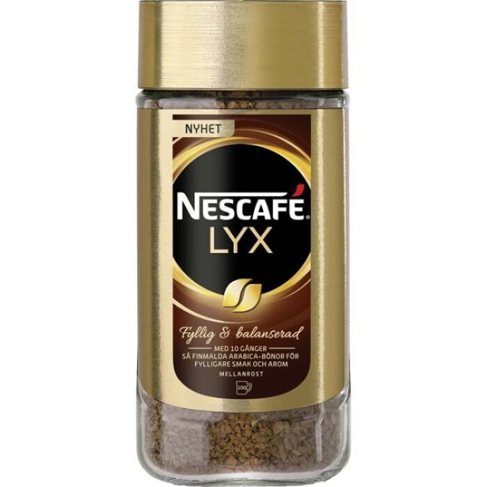 Burk med Nescafé Lyx snabbkaffe, fyllig och balanserad smak, mellanmörkrost.