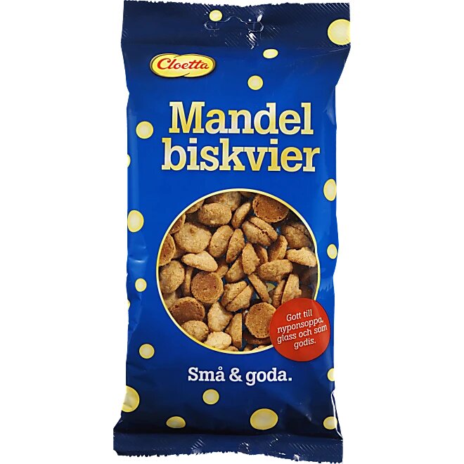 Förpackning med mandelbiskvier från Cloetta, blå påse med gula prickar och texten "Små & goda", samt cirkelformad bild av mandelbiskvier.