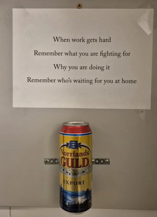 Inspirerande text med en ölburk av Norrlands Guld Export.