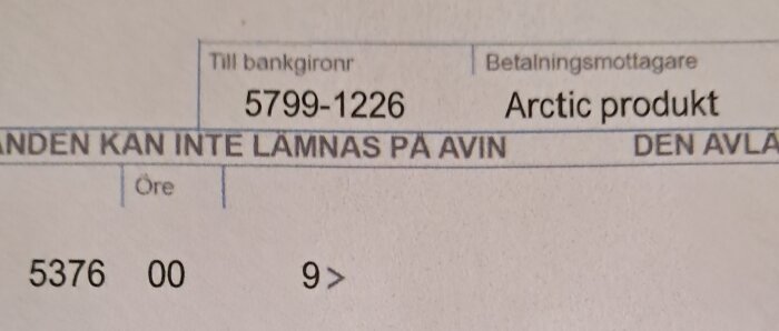 Delfoto av en blankett med texten "Till bankgironr: 5799-1226", betalningsmottagare "Arctic produkt", och en summa "5376 00" med öreangivelse.