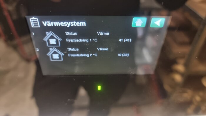 Skärm som visar värmesystemstatus: Element 41°C (41), Värmegolv 19°C (33).