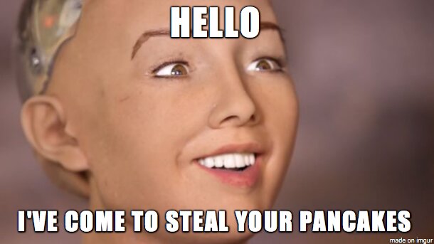 Robotansikte med glad min, text ovan: "HELLO", text nedan: "I'VE COME TO STEAL YOUR PANCAKES".