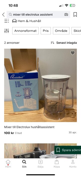 Förpackning och mixer för Electrolux hushållsassistent till salu, modell Assistent i kartong och mixer vid sidan.