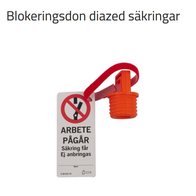 Blokeringsdon för diazed-säkringar med varningsskylt "Arbete pågår, säkring får ej anbringas", i orange plast.