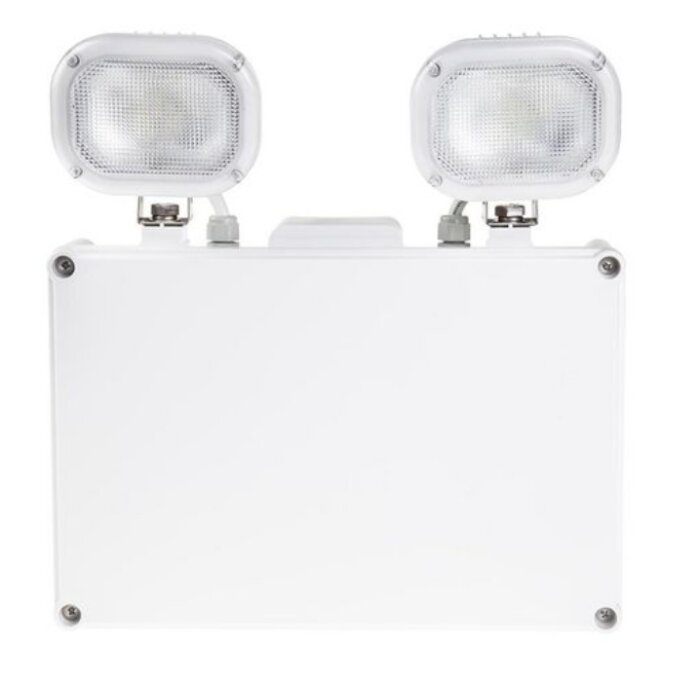 Batteridriven nödbelysningsenhet med två justerbara, vita lampor monterade på en rektangulär bas, använd för vid strömavbrott.