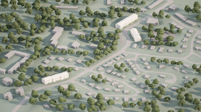 Fågelperspektiv av en stadsplan med byggnader och träd, som visar ett bostadsområde med blandad bebyggelse och kringliggande grönska.