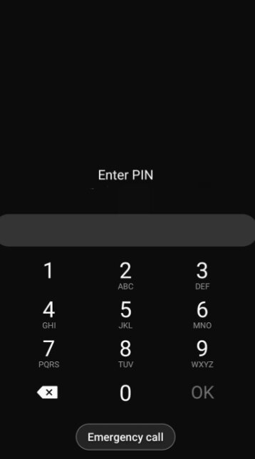 En skärmbild av en nummersats med texten "Enter PIN" och en "Emergency call"-knapp längst ner.