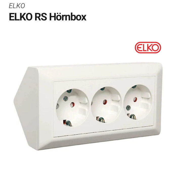 Väggmonterad ELKO RS hörnbox med tre eluttag i vit färg, avsedd för att placeras i hörn.