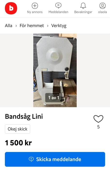Bandsåg märkt "Lini" till salu i okej skick för 1500 kr, visad framifrån på betonggolv.