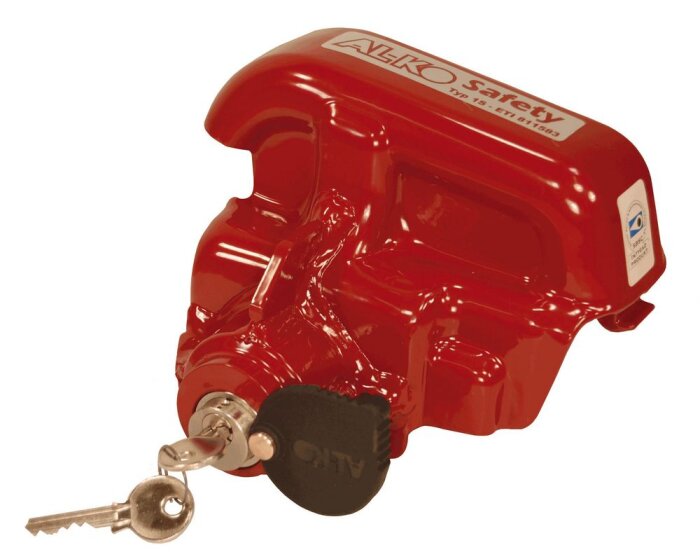 Röd släpvagnslås av märket AL-KO med nyckel insatt.