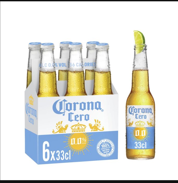 Sexpack och flaska med Corona Cero alkoholfri öl, en flaska med en limeklyfta.