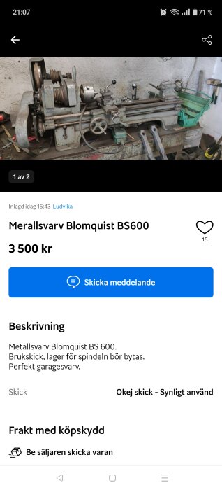 Metallsvarv Blomquist BS600 i använt skick, står i ett garage med verktyg runtomkring.