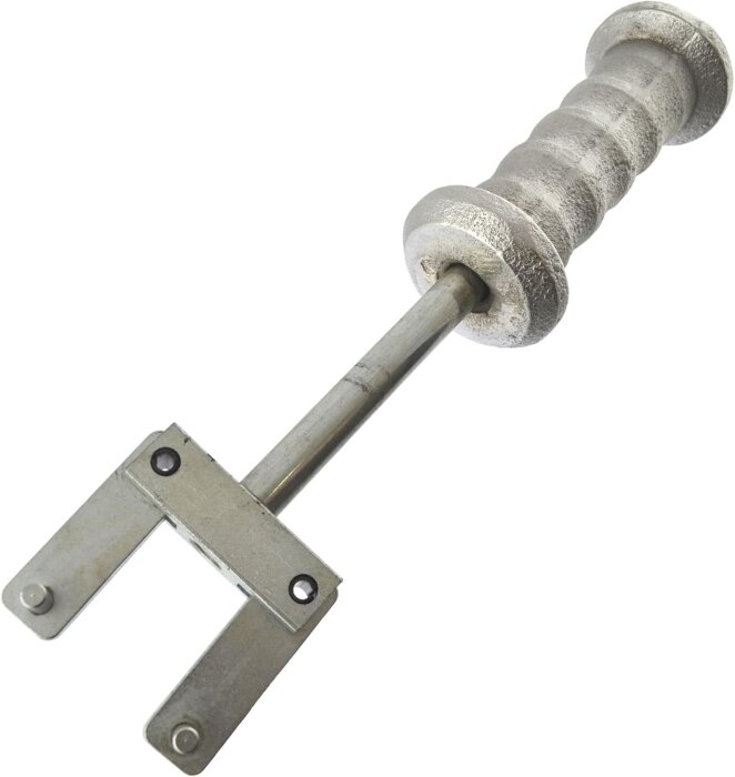 Glidhammare med handtag i metall och en platt del med hål, används ofta vid mekaniskt arbete.