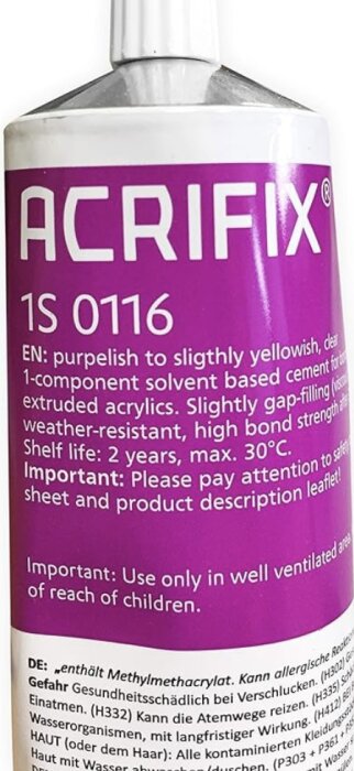 Tub med ACRIFIX 1S 0116, ett lim för återkommande användning på extruderad akryl. Text på engelska och tyska syns på etiketten.