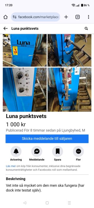 Blå Luna punktsvets med kontrollpanel och svetsarmar, placerad på ett golv framför en rad av transportvalsar.