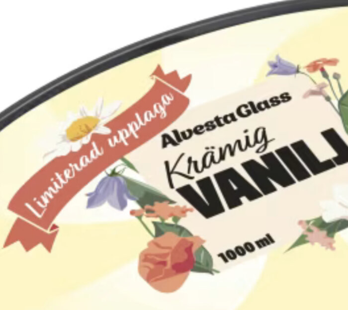 Förpackning av Alvesta Glass Krämig Vanilj med texten "Limiterad upplaga" och blommotiv, 1000 ml.