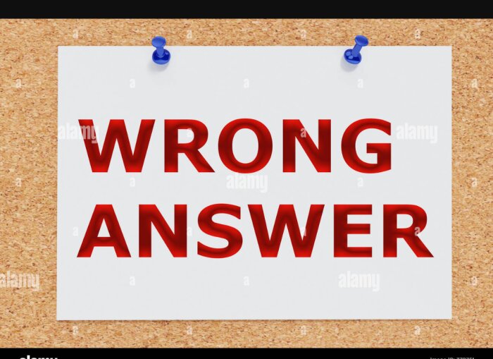 Papperslapp med texten "WRONG ANSWER" i röd färg uppsatt med två nålar på en anslagstavla.