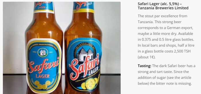 Två flaskor Safari Lager öl från Tanzania med blå och gul etikett, alkoholhalt 5,5%.