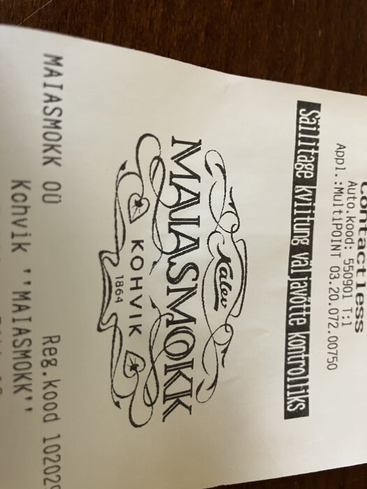 Kvitto från Maiasmokk café i Tallinn med text och logotyp.