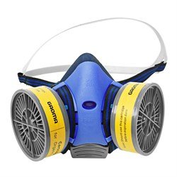 Gasmask med blå näsdel och gula filterpatroner, användbar vid rivning med potentiell asbestexponering.