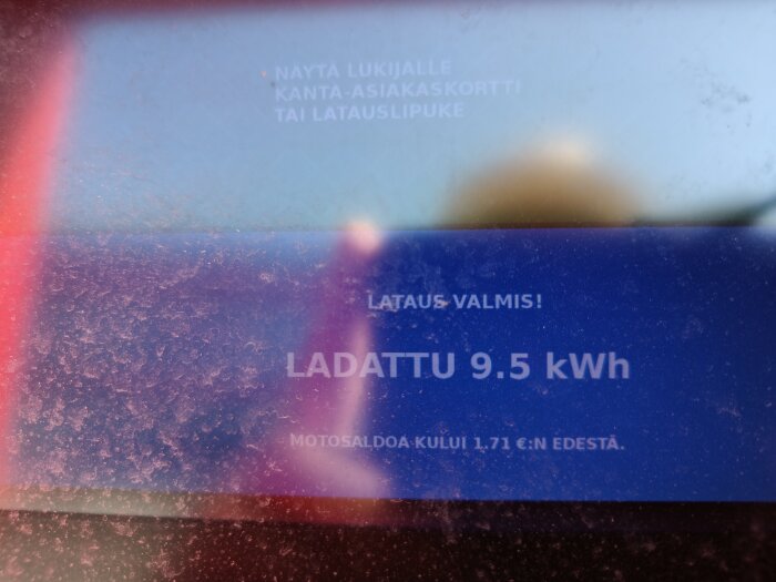 Display på laddstation i Finland, visar laddat 9,5 kWh.