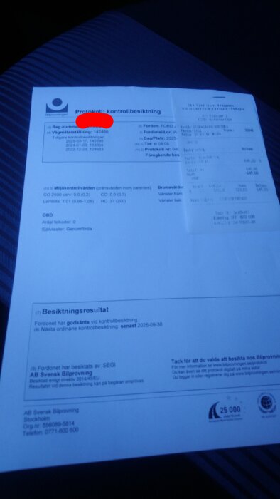 En besiktningsrapport från Svensk Bilprovning som visar att en bil har godkänts vid kontrollbesiktningen.