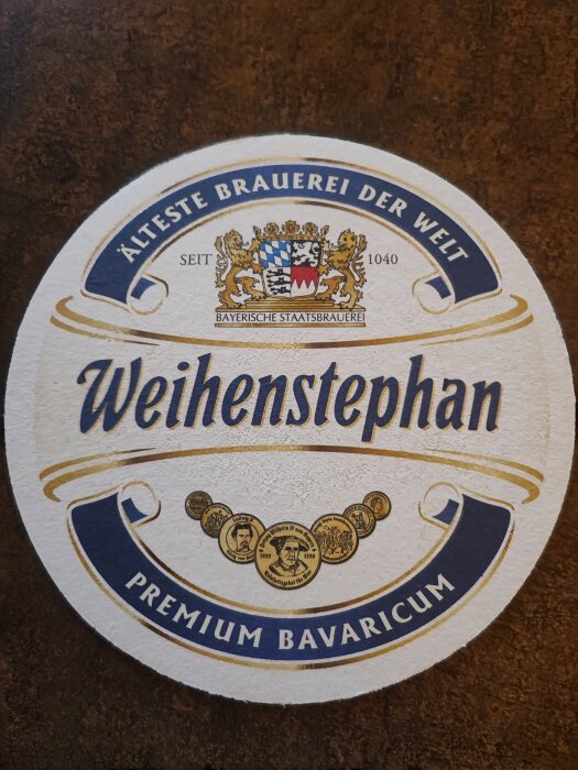 Underlägg från Weihenstephan, världens äldsta bryggeri, med text "Älteste Brauerei der Welt" och "Premium Bavaricum".