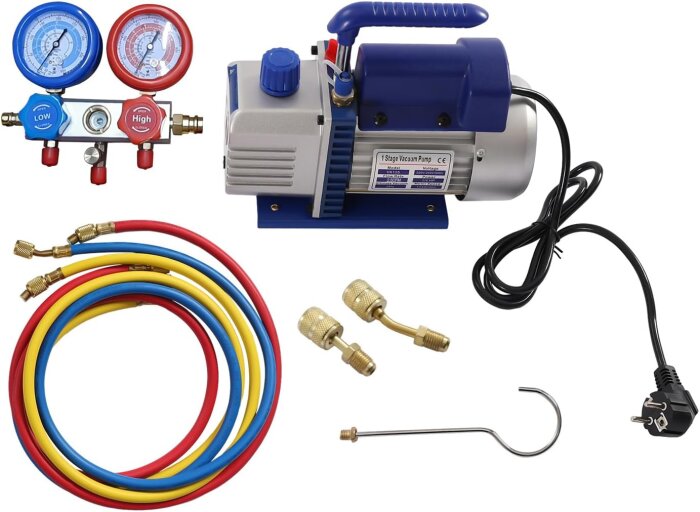 Vakuumpump för luftkonditionering med manometrar, färgade slangar och andra tillbehör.