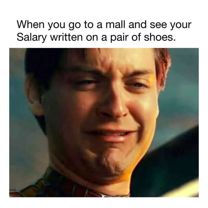 Gråtande man med texten "When you go to a mall and see your Salary written on a pair of shoes.