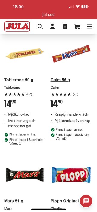 Bild på Jula-webbsida som visar Toblerone och Daim i mjölkchoklad, samt Mars och Plopp-choklad, med priser och lagerstatus.