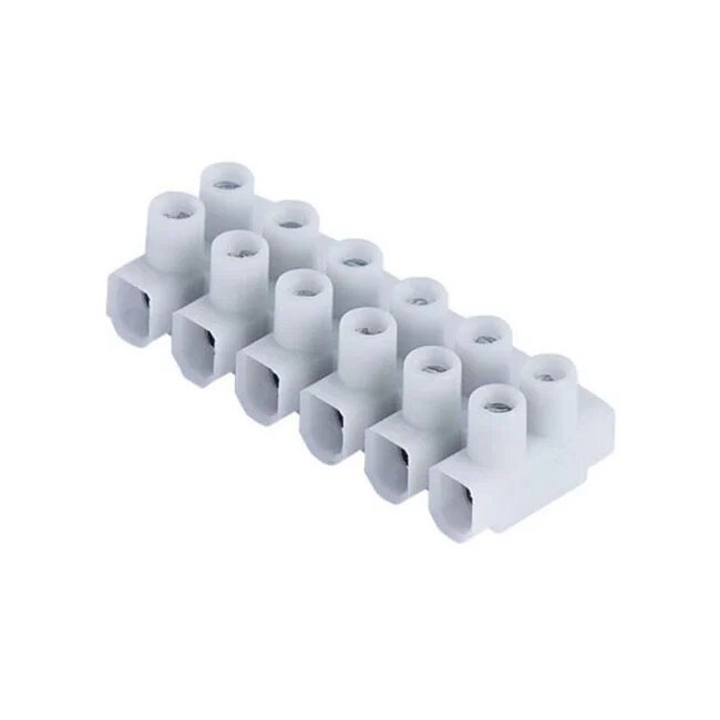 Liten vit kopplingslist med flera anslutningar för elinstallationer.