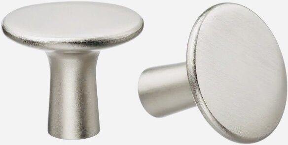 Två runda, borstad metallknoppar, en liggandes och en stående, med slät yta, för möbel- eller skåpsdörrar.