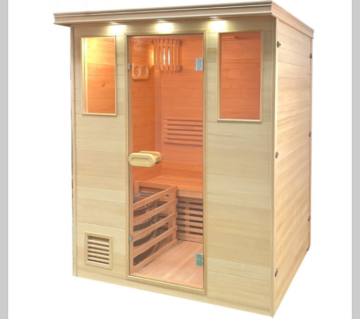 Fristående basturum i trä med glasdörrar, belysning och sittbänkar inuti. Perfekt för installation i ett isolerat men ovalt garage.