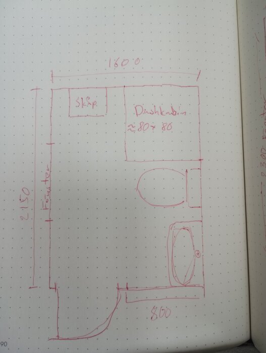 Handritad planlösning för ett badrum på 2150x160 cm med duschkabin, toalett och skåp markerade i rött på rutat papper.