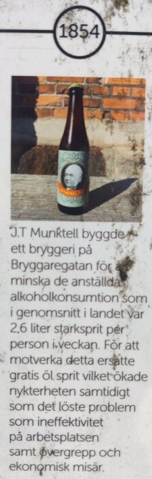 Flaska med etikett föreställande person och texten "1854"; diskuteras minskning av alkoholkonsumtion genom ölbryggeri för ökad nykterhet.
