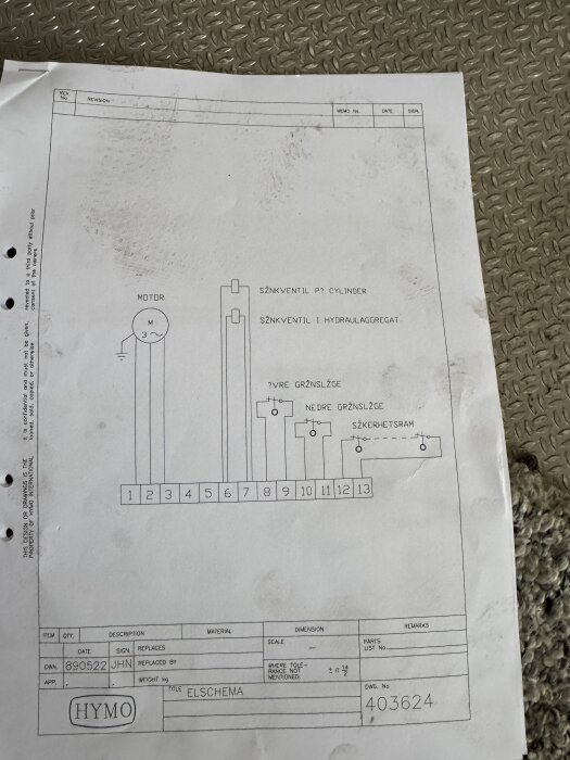 Elschema på papper med systemkomponenter markerade, inkluderande motor, ventiler och säkerhetsram. Dokumentet har ritningsnummer 403624.