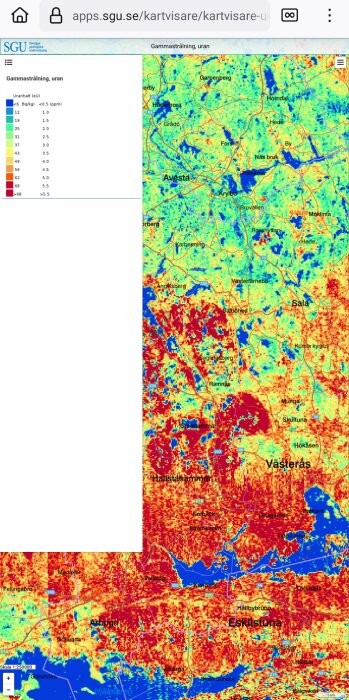Karta över uranstrålning i Sverige med hög koncentration i Västerås-området, visas i rött och orange.