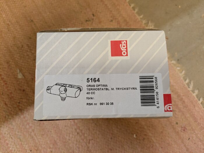 Förpackning för Oras Optima 5164 duschblandare, ej monterad, 40 CC tryckstyrning, återfinns i garageutrensningens bild.
